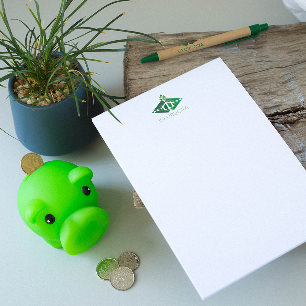 Branded Notepad and Piggy bank